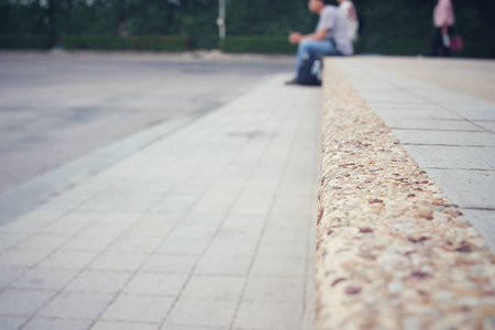 Blurred of man sittingの写真素材