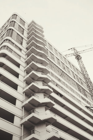 Crane with building
