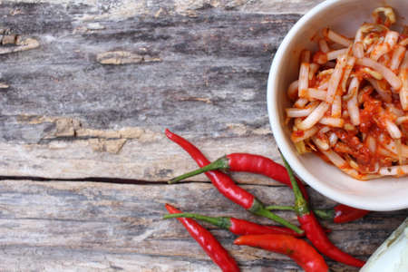 Bean sprouts kimchi korean food on the wood backgroundの写真素材