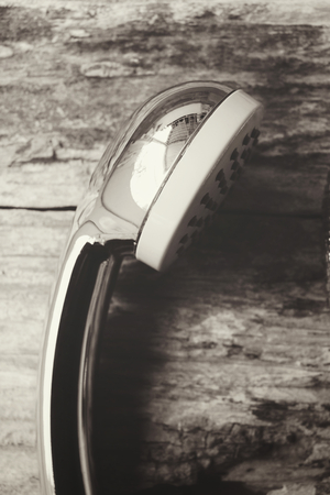 Shower head on wood backgroundの写真素材