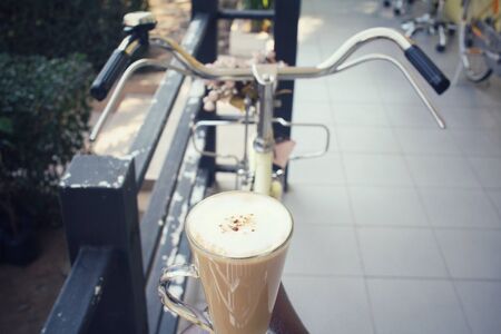 Hot coffee with bicycleの写真素材