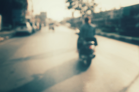 Blurred of car in city at nightの写真素材