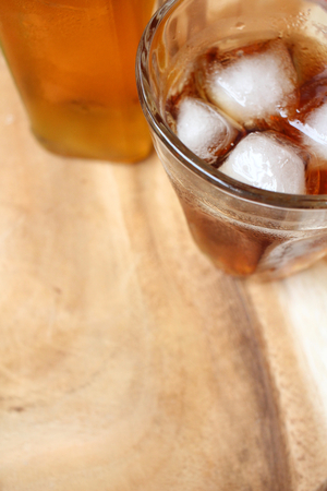 Glass of whiskey with iceの写真素材