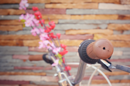 Vintage bicycle handlebar with sakura flowersの写真素材