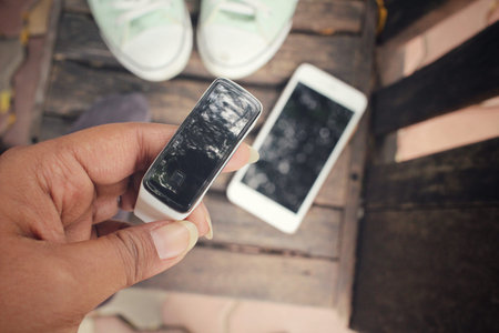 Smartwatch with smart phone and sneakers