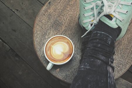 Selfie of coffee with shoesの写真素材