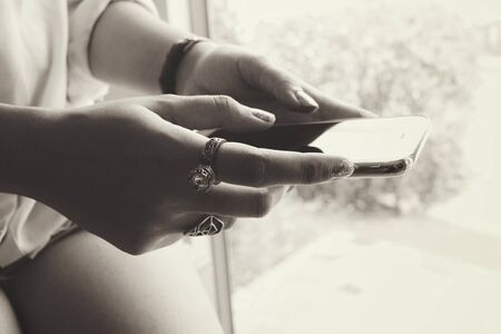 Woman using smart phoneの写真素材