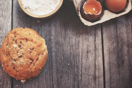 Bread with eggs and flourの写真素材