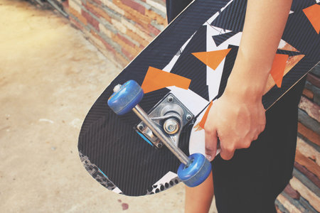 Young girl with skateboard