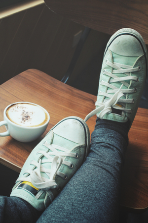 Selfie of coffee with shoesの写真素材