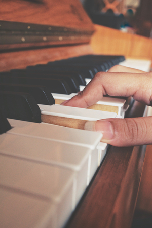 Woman playing pianoの写真素材