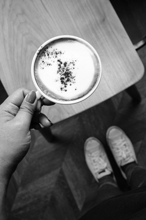 Selfie of coffee with shoesの写真素材