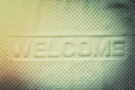 Welcome doormat in the bedroomの写真素材