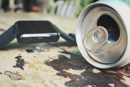 Smartwatch with cola canの写真素材