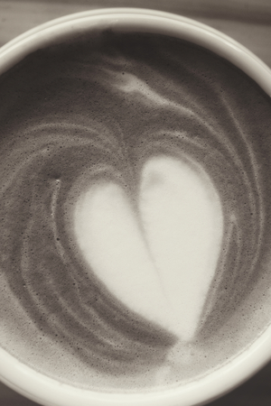 Vintage latte art coffeeの写真素材