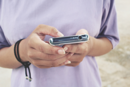 Woman using smart phoneの写真素材