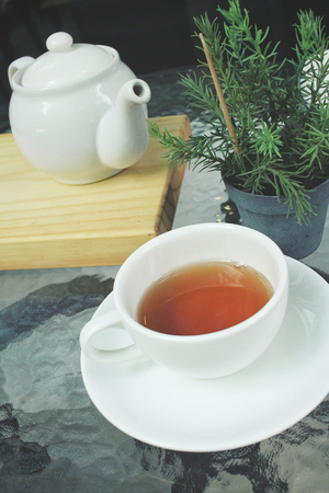 Tea pot with cupの写真素材