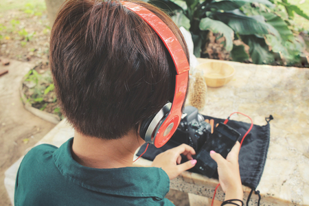 Young woman listen to music with headphoneの写真素材