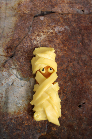 Mummy of cheese with sausage in halloween dayの写真素材