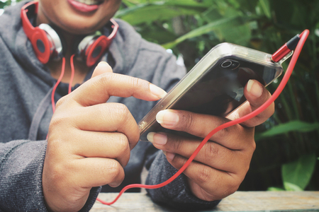 Headphones with smart phoneの写真素材