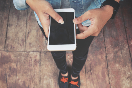 Woman using smart phoneの写真素材