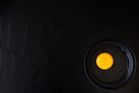 Egg on black backgroundの写真素材
