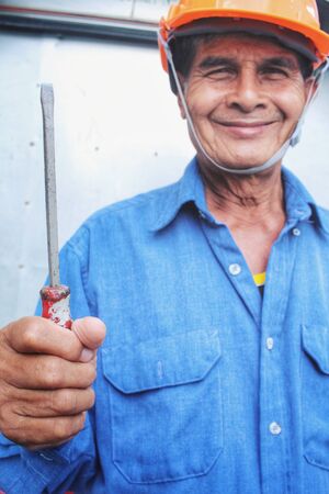 Screwdriver on handの写真素材