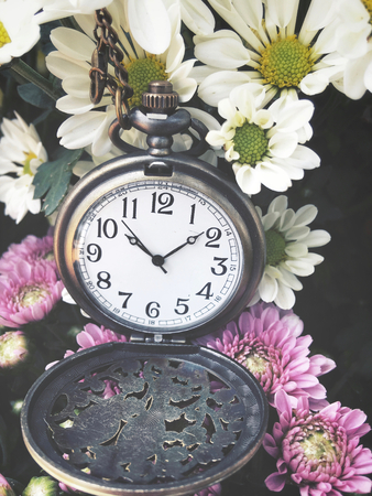 Vintage watch pocket with flowersの写真素材