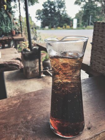 Cola with ice cubesの写真素材