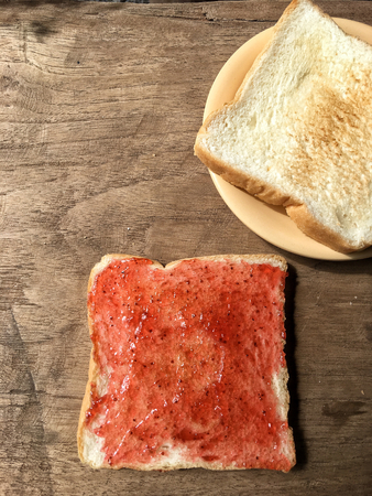 Slice toast bread with strawberry jamの写真素材