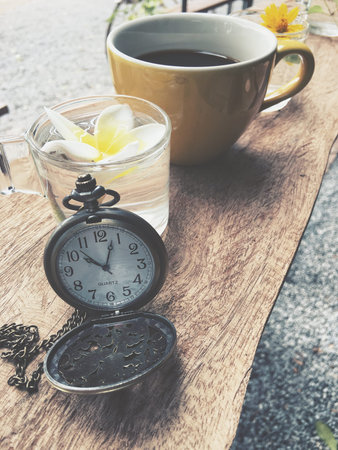 Espresso coffee with vintage watch pocketの写真素材