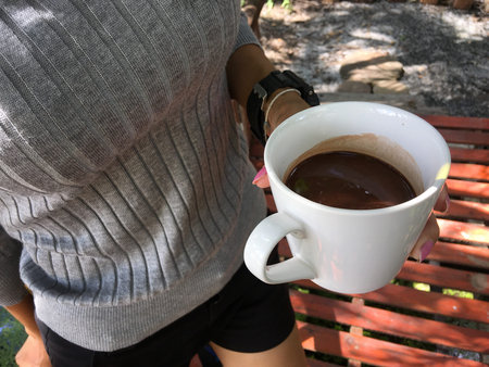 Woman drinking hot chocolate の写真素材