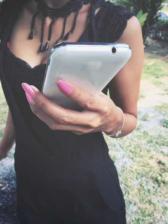 Woman using smart phoneの写真素材