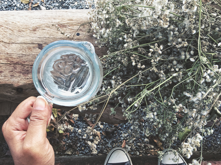 Water drink with handの写真素材