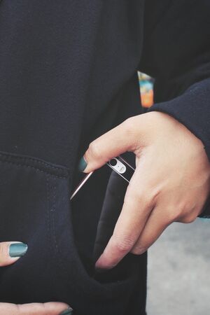 Smart phone in pocketの写真素材