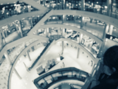 Blurred people shopping mallの写真素材