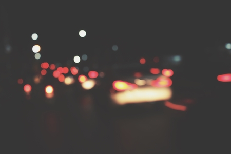 Blurred of car on road at nigthの写真素材