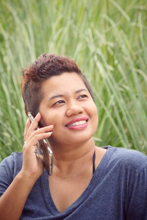 Woman using smart phoneの写真素材