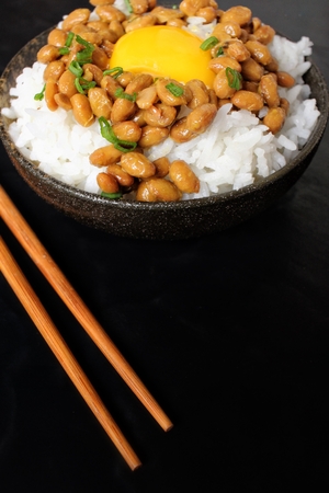 Natto with cooked rice and egg japanese foodの写真素材