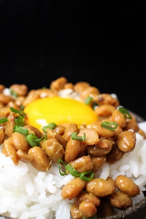 Natto with cooked rice and egg japanese foodの写真素材
