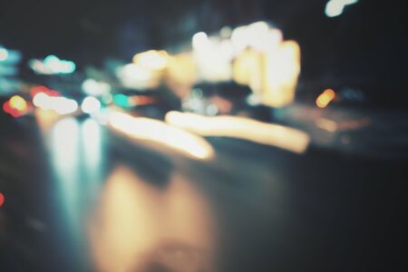 Blurred of car on road at nigthの写真素材