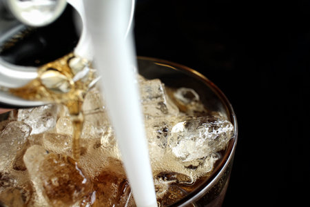Cola with ice cubes
