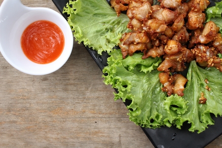 Fried chicken chinese food with sriracha sauceの写真素材