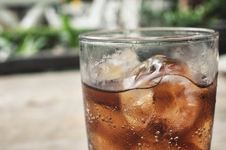 Cola with ice cubes