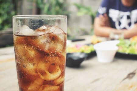 Cola with ice cubesの写真素材