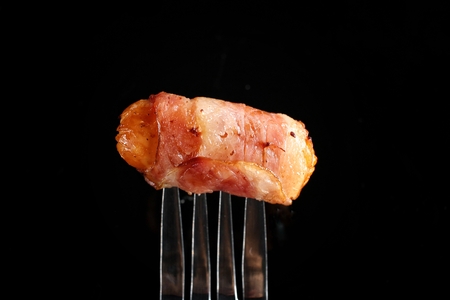 Sausage wrapped in baconの写真素材