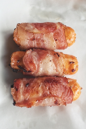 Sausage wrapped in baconの写真素材