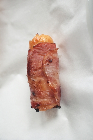 Sausage wrapped in baconの写真素材