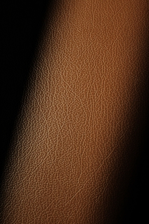 Brown leather with shadow backgroundの写真素材
