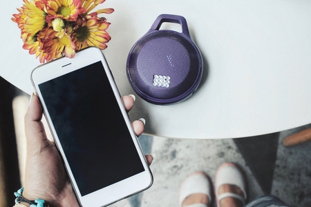 Selfie of woman and   speaker with smart phoneの写真素材